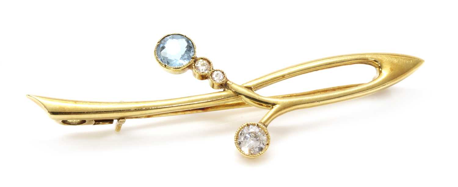 Lot 115 - A gold aquamarine and diamond bar brooch, c.1915