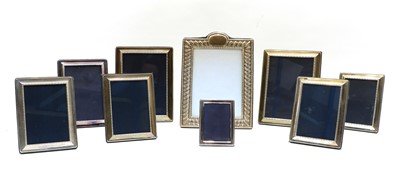 Lot 97 - Nine beaded silver easel back photograph frames
