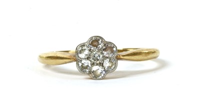 Lot 14 - A gold diamond set daisy cluster ring