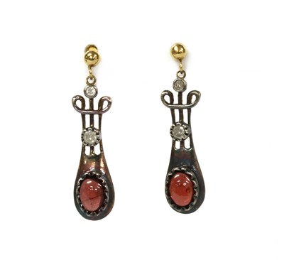 Lot 149 - A pair of silver and gold, garnet and diamond drop earrings