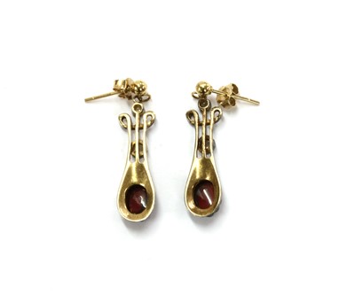 Lot 149 - A pair of silver and gold, garnet and diamond drop earrings