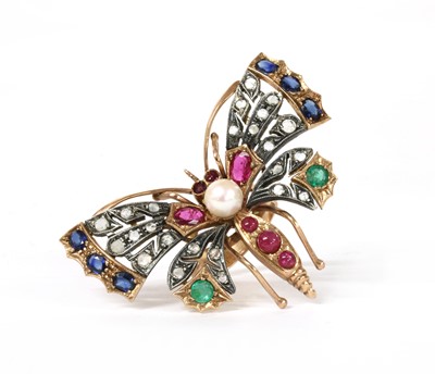 Lot 134 - A gold and silver, diamond and assorted gemstone butterfly ring