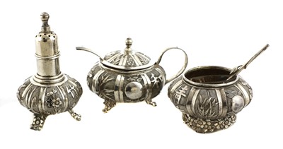 Lot 134 - A Chinese silver salt, mustard pot and pepper shaker set