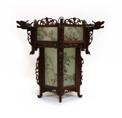 Lot 343 - A Chinese hexagonal carved wood and painted glass lantern