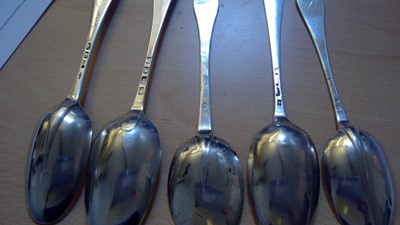 Lot 68 - A collection of five 18th century serving spoons