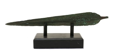 Lot 334 - A Luristan bronze sword on stand