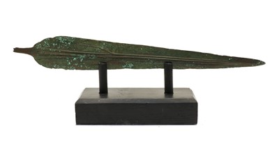 Lot 334 - A Luristan bronze sword on stand