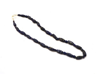 Lot 321 - A Bactrian lapis lazuli bead necklace