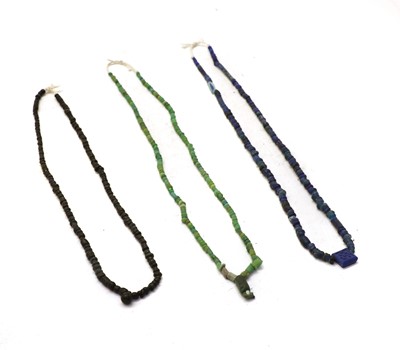 Lot 320 - Three Roman glass and stone bead necklaces