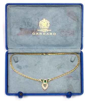 Lot 343 - An 18ct gold emerald and diamond necklace, by Garrard & Co., c.1988