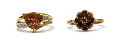 Lot 1384 - A gold mystic yellow topaz and diamond ring