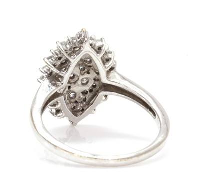 Lot 1201 - A 9ct white gold diamond cluster ring