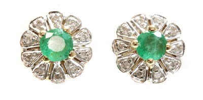Lot 357 - A pair of 9ct gold emerald and diamond circular cluster earrings