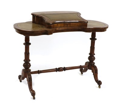 Lot 275 - A Victorian walnut ladies writing table
