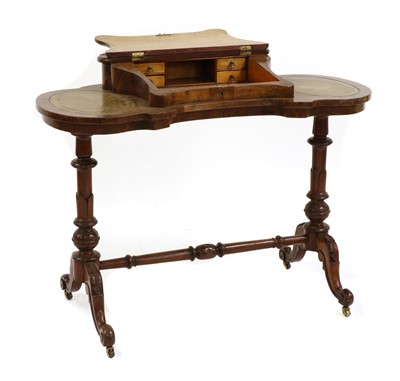 Lot 275 - A Victorian walnut ladies writing table