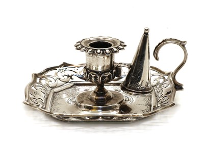 Lot 5 - A Victorian silver candlestick and snuffer