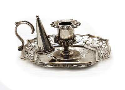 Lot 5 - A Victorian silver candlestick and snuffer