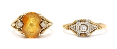 Lot 183 - A 9ct gold citrine and paste ring
