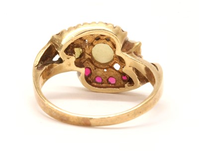 Lot 173 - A gold opal and synthetic ruby ring