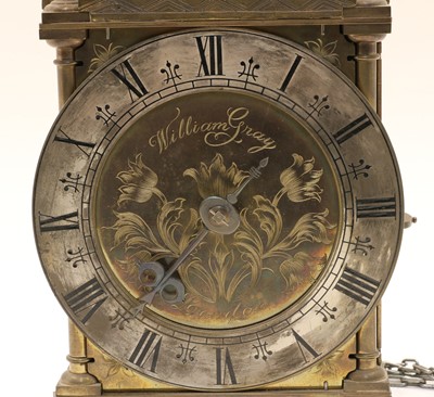 Lot 366 - A brass lantern clock