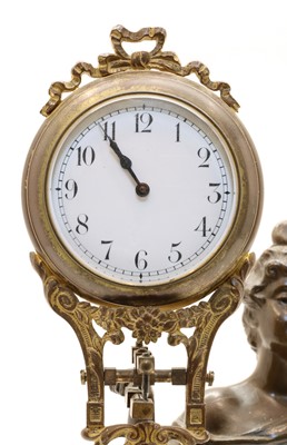 Lot 173 - A spelter figural mystery clock