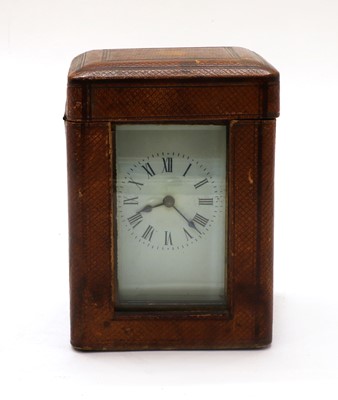 Lot 176 - A brass carriage clock