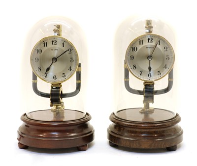 Lot 339 - Two 800 day electric clocks