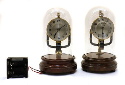 Lot 339 - Two 800 day electric clocks