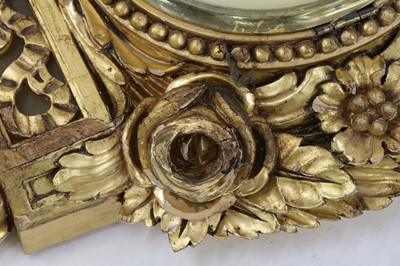 Lot 402 - A carved giltwood cartel clock