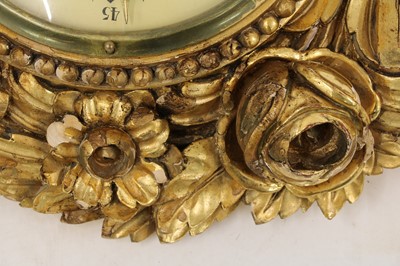 Lot 402 - A carved giltwood cartel clock