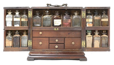 Lot 547 - A Georgian mahogany apothecary's cabinet