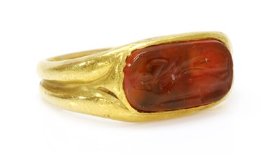 Lot 1 - A high carat gold carved cornelian intaglio ring