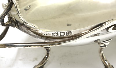 Lot 105 - An Arts and Crafts silver twin-handled bowl