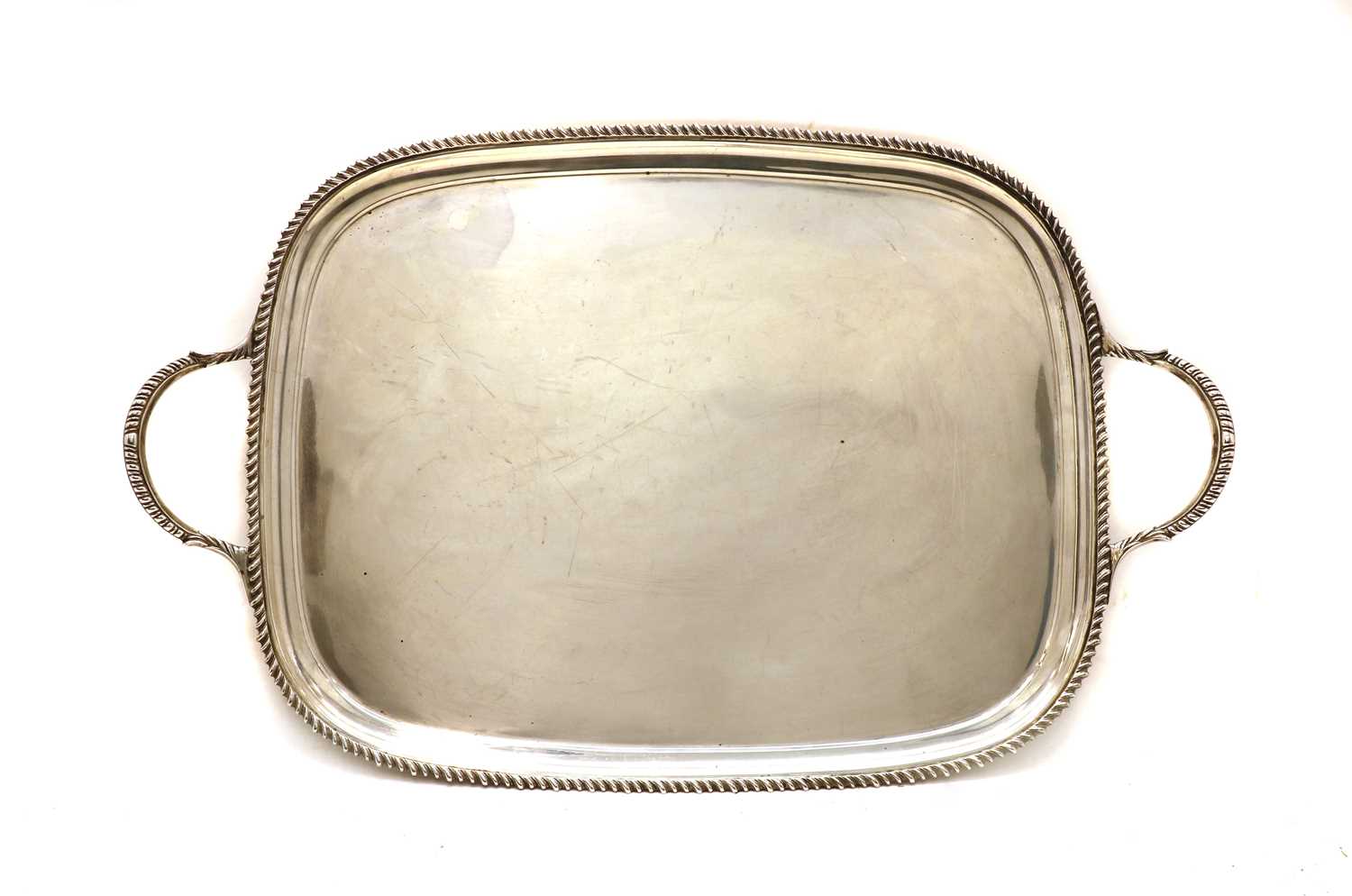 Lot 22 - A twin handled silver serving tray