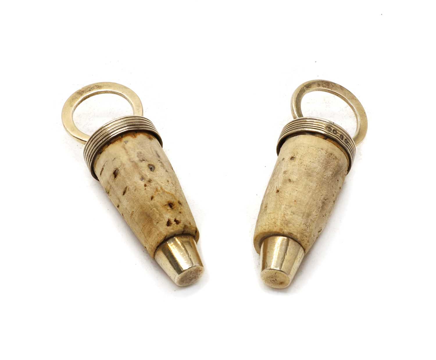 Lot 16 - Two antique silver and cork bottle stoppers