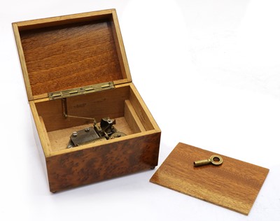 Lot 341 - An Austrian amboyna and kingwood musical box