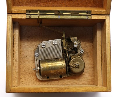 Lot 341 - An Austrian amboyna and kingwood musical box