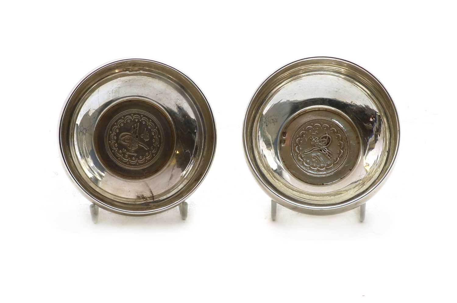 Lot 104 - Two silver coloured metal bowls