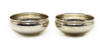 Lot 104 - Two silver coloured metal bowls