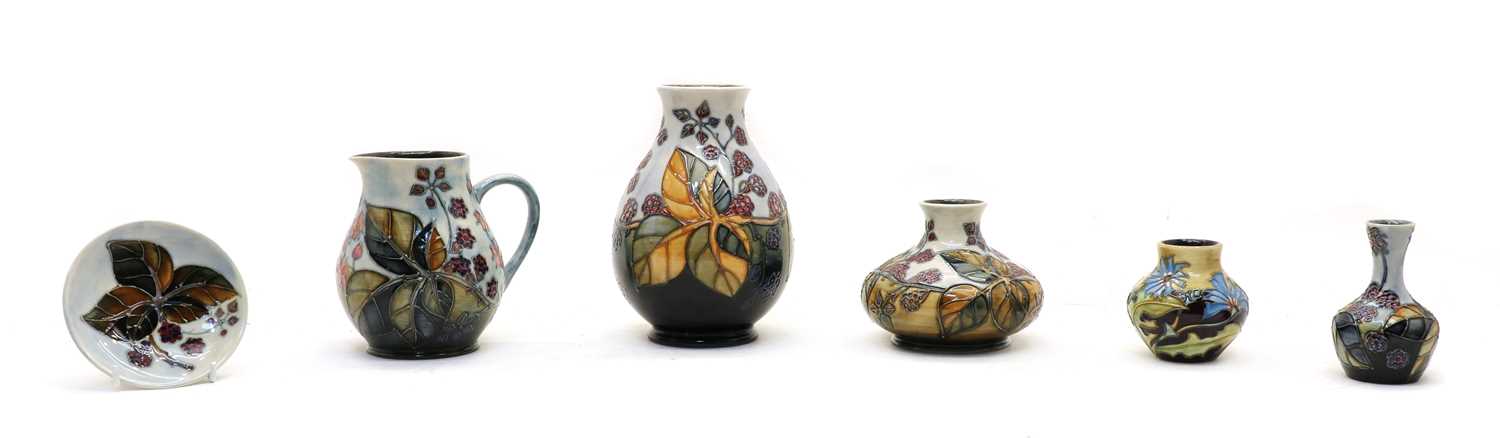 Lot 414 - A collection of Moorcroft 'Bramble' pattern