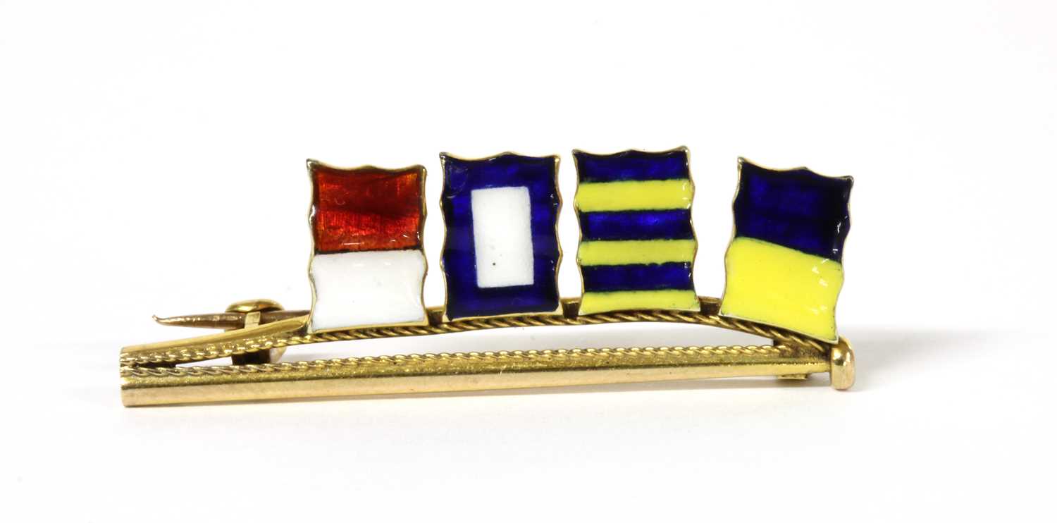 Lot 1043 - A gold enamel signal flag brooch, by Benzie of Cowes