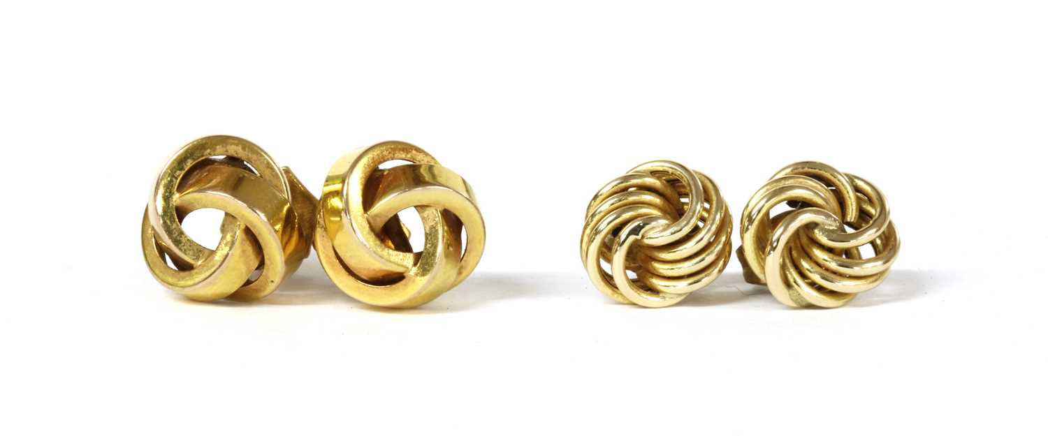 Lot 104 - Two pairs of gold knot earrings