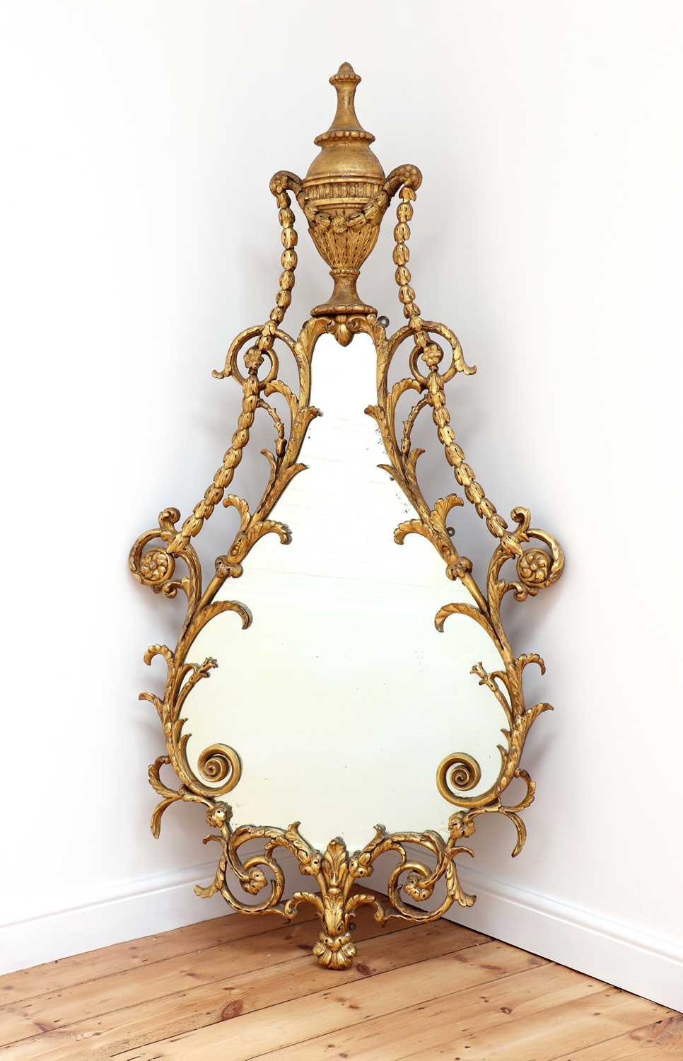 Lot 16 - A George III giltwood wall mirror