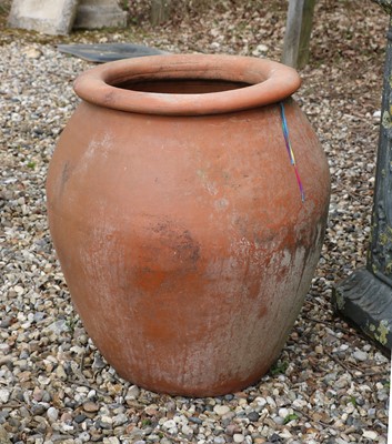Lot 497 - A large terracotta garden urn planter