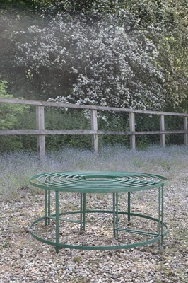 Lot 786 - A Regency-style green-painted wrought iron tree seat