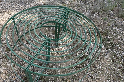 Lot 786 - A Regency-style green-painted wrought iron tree seat