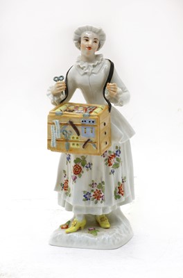 Lot 420 - A Meissen porcelain figure of a trinket seller