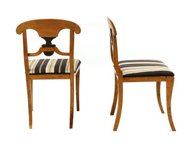 Lot 388 - A pair of Biedermeier maple side chairs