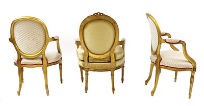 Lot 390 - A pair of French Louis XVI-style giltwood fauteuils