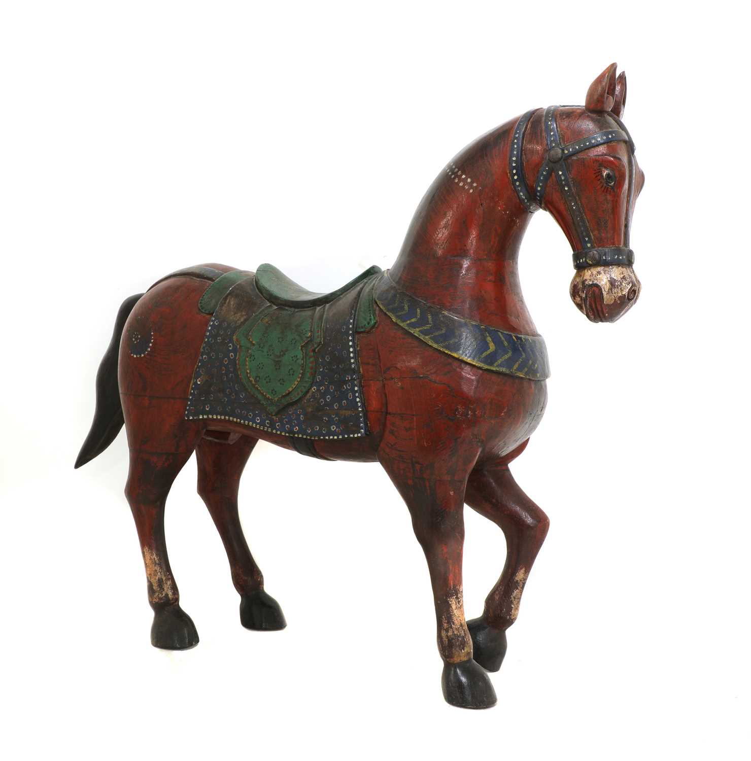 Lot 9 - An Indian polychrome painted wooden horse